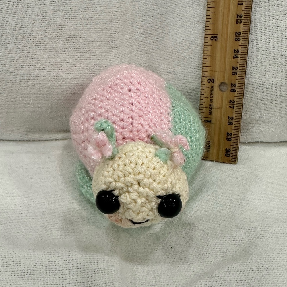 Pink and Green Stuffed Snail Toy